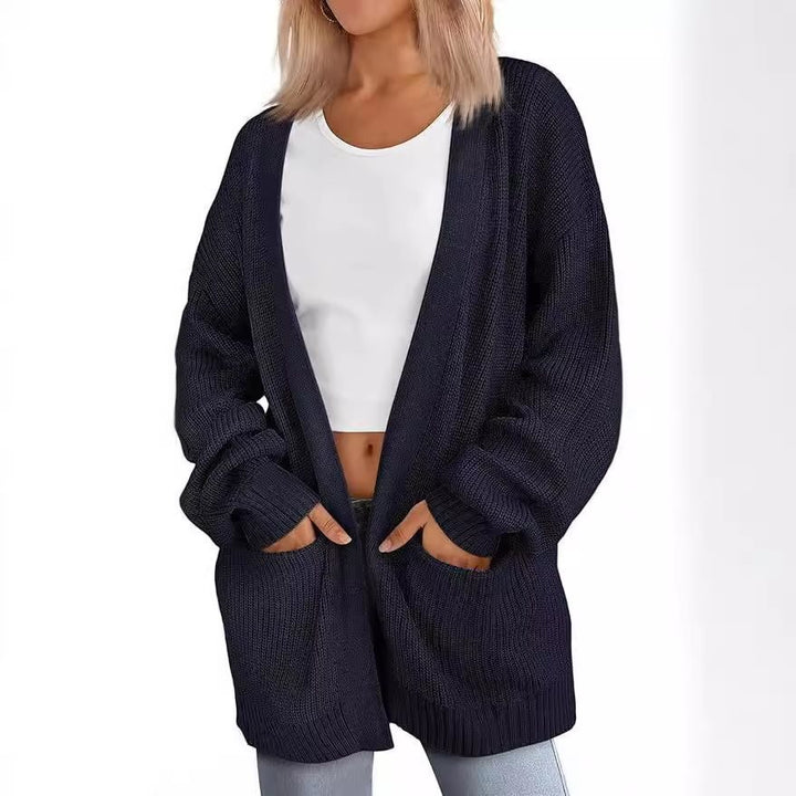 Kvinnors avslappnad stickad cardigan med stora fickor och öppen design Mirla-Eva Jonsson