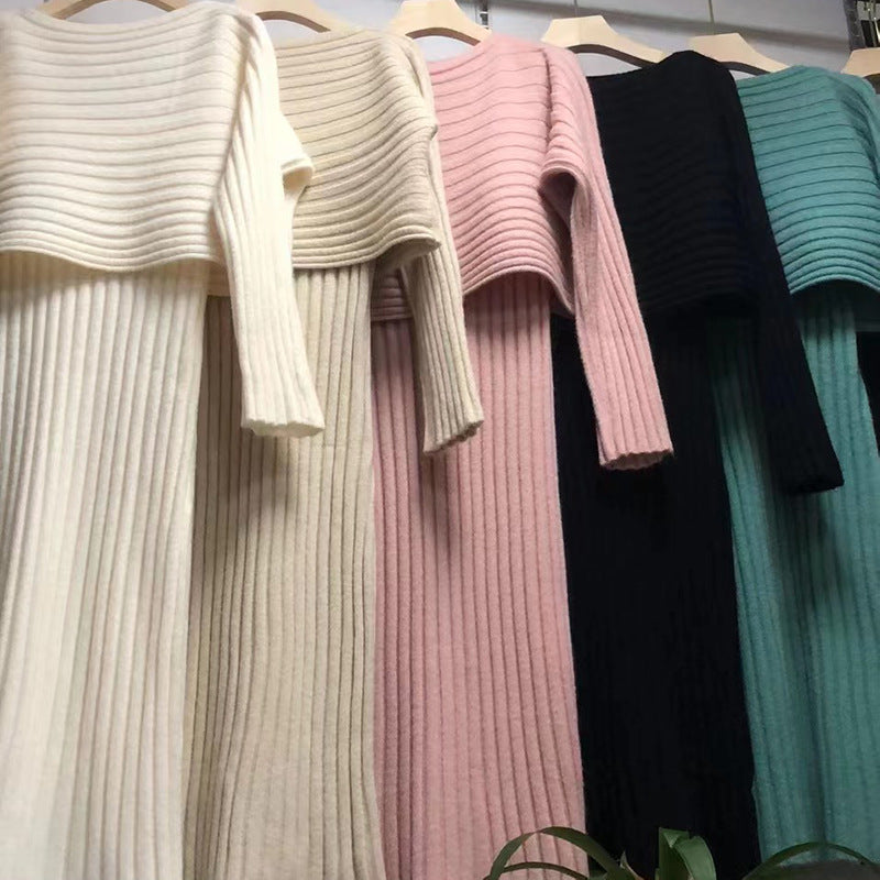 Kvinnors avslappnad stickad tröja med asymmetrisk halsringning och ribbad textur Mirla-Eva Jonsson