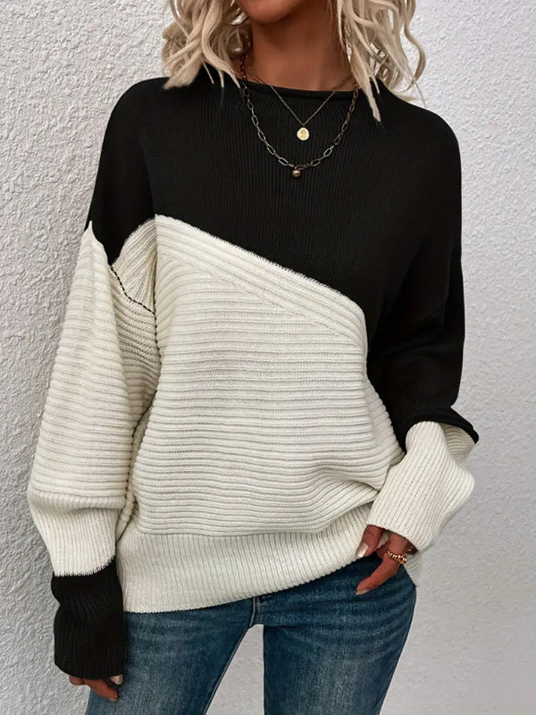 Kvinnors avslappnad stickad tröja med texturerad design och moderna färgblock Mirla-Eva Jonsson