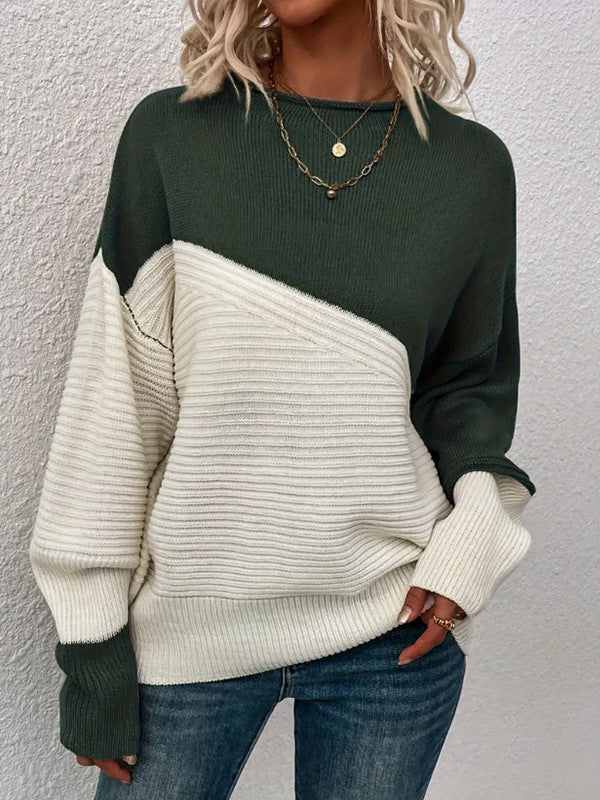 Kvinnors avslappnad stickad tröja med texturerad design och moderna färgblock Mirla-Eva Jonsson