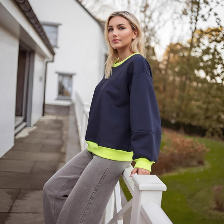 Kvinnors avslappnad sweatshirt med kontrasterande mudd och modern skärning Mirla-Eva Jonsson