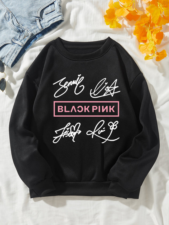 Kvinnors avslappnad sweatshirt med kreativ signaturmotiv Mirla-Eva Jonsson