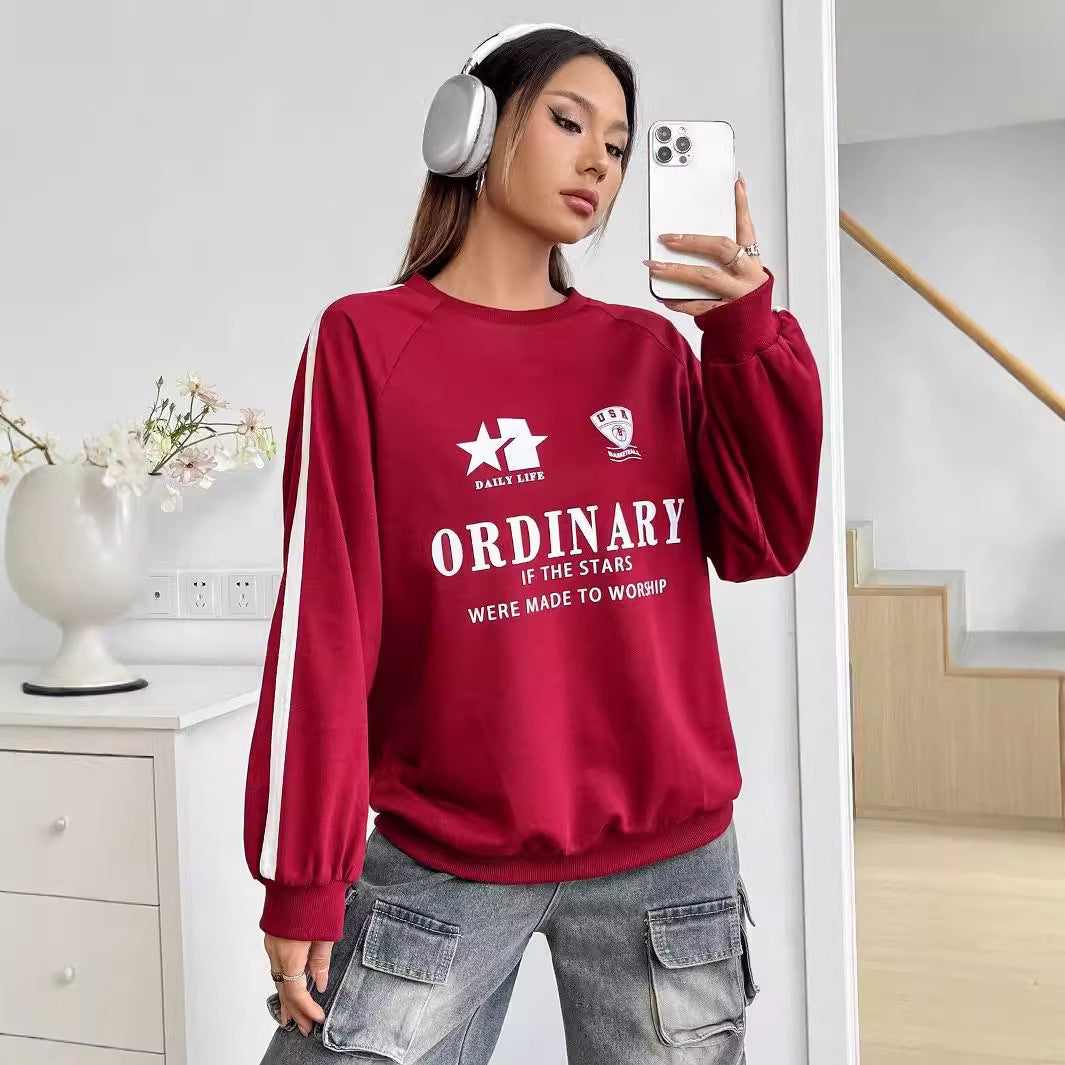 Kvinnors avslappnad sweatshirt med kreativa grafiker och voluminösa ärmar Mirla-Eva Jonsson