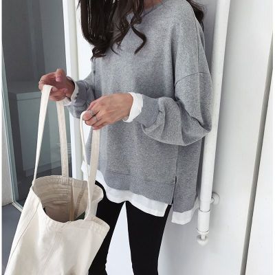Kvinnors avslappnad sweatshirt med lös passform och moderna detaljer-Eva Jonsson