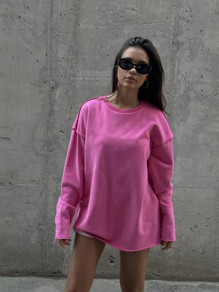 Kvinnors avslappnad sweatshirt med oversized passform och rullade ärmar Mirla-Eva Jonsson