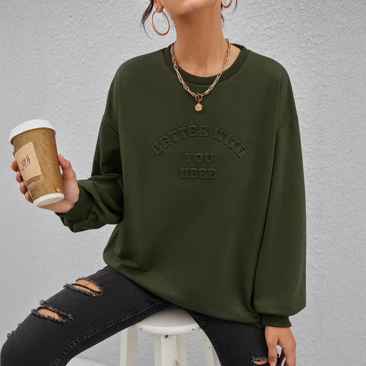 Kvinnors avslappnad sweatshirt med prägling lettering Mirla-Eva Jonsson