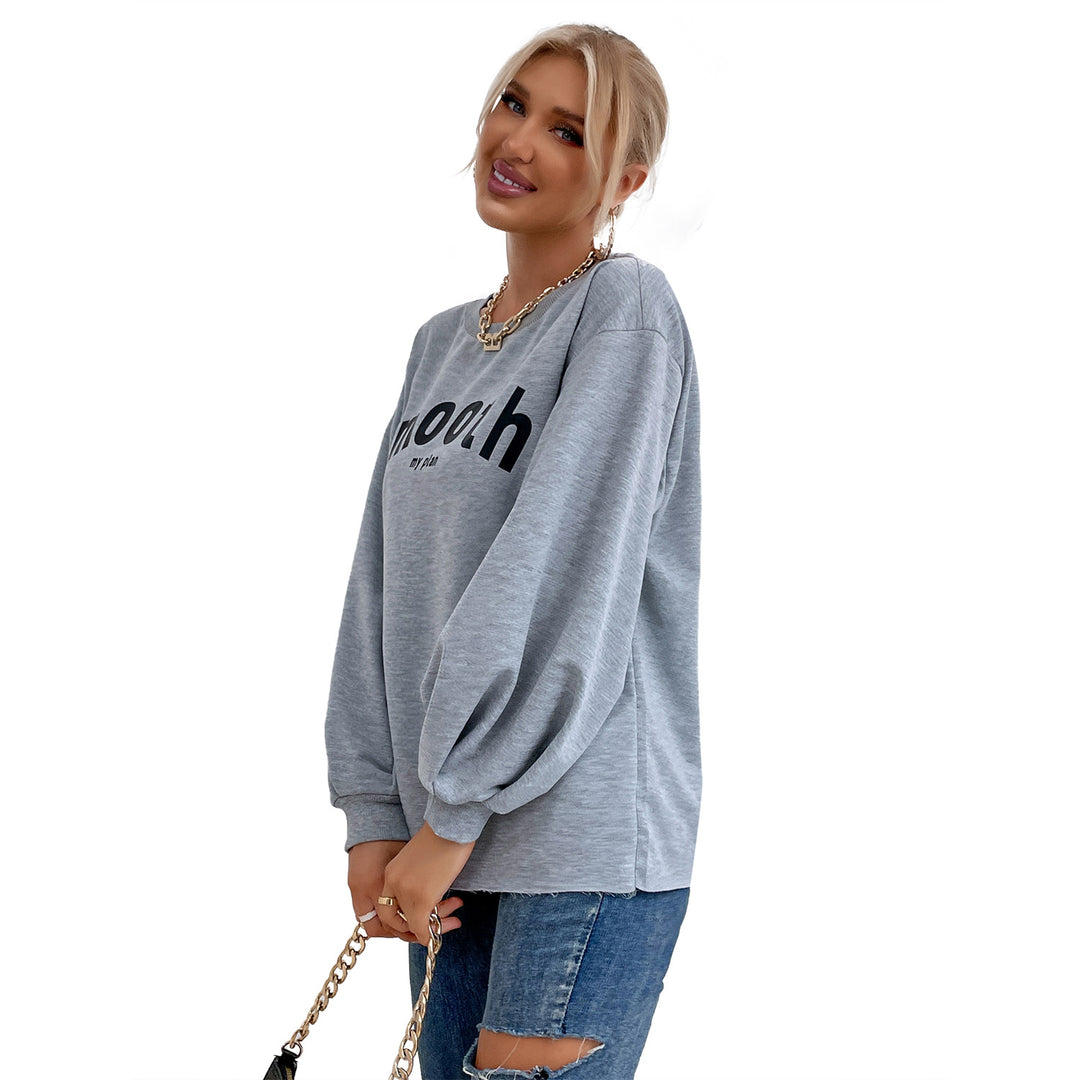 Kvinnors avslappnad sweatshirt med raffinerade puffärmar och kreativ lettering Mirla-Eva Jonsson