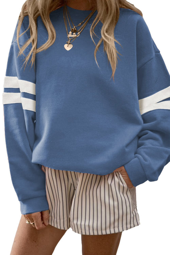 Kvinnors avslappnad sweatshirt med sportig design Mirla-Eva Jonsson