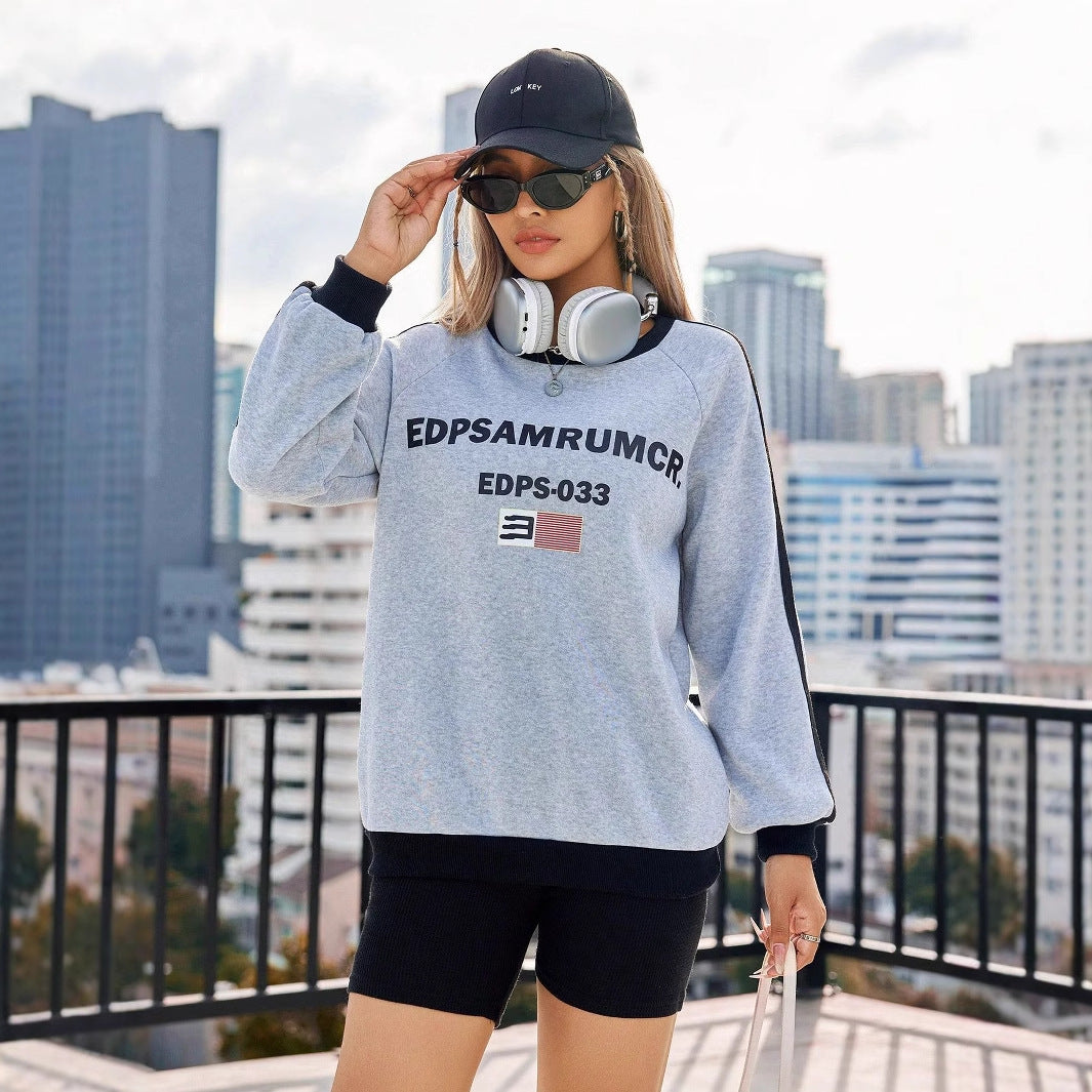 Kvinnors avslappnad sweatshirts med grafisk tryck och kontrasterande ärmar Mirla-Eva Jonsson
