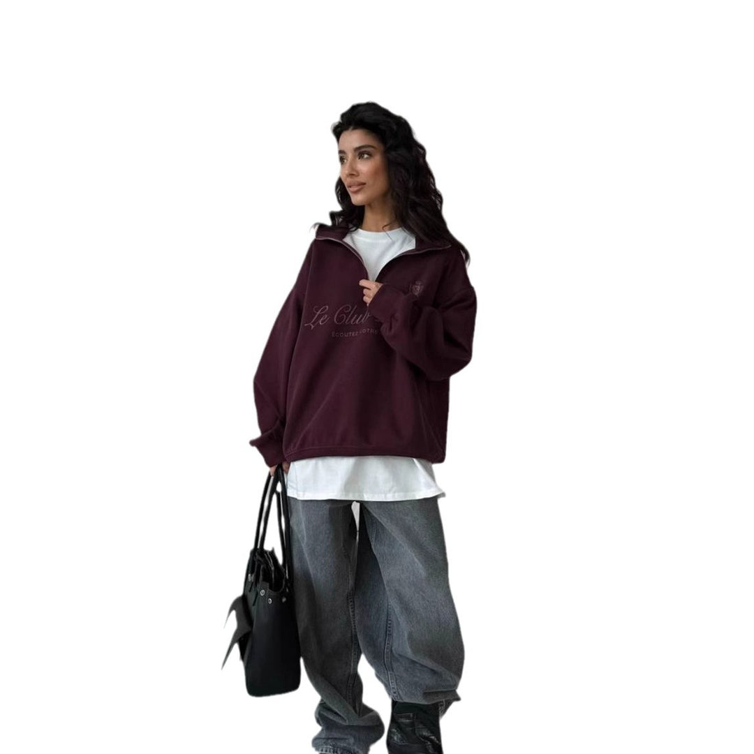Kvinnors avslappnad tröja med halvmeterdragkedja och grafiskt tryck Mirla-Eva Jonsson
