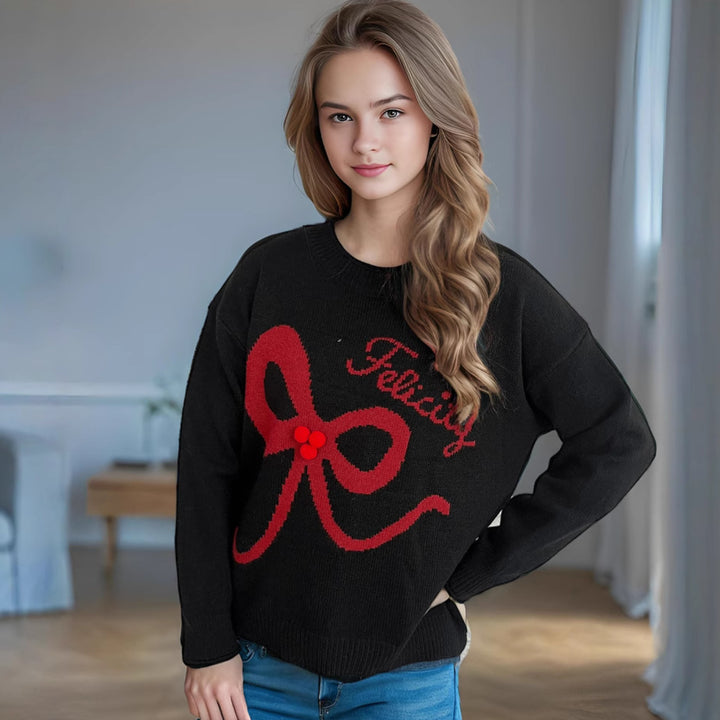 Kvinnors avslappnad tröja med lekfullt rosettmotiv och mjukt material Mirla-Eva Jonsson