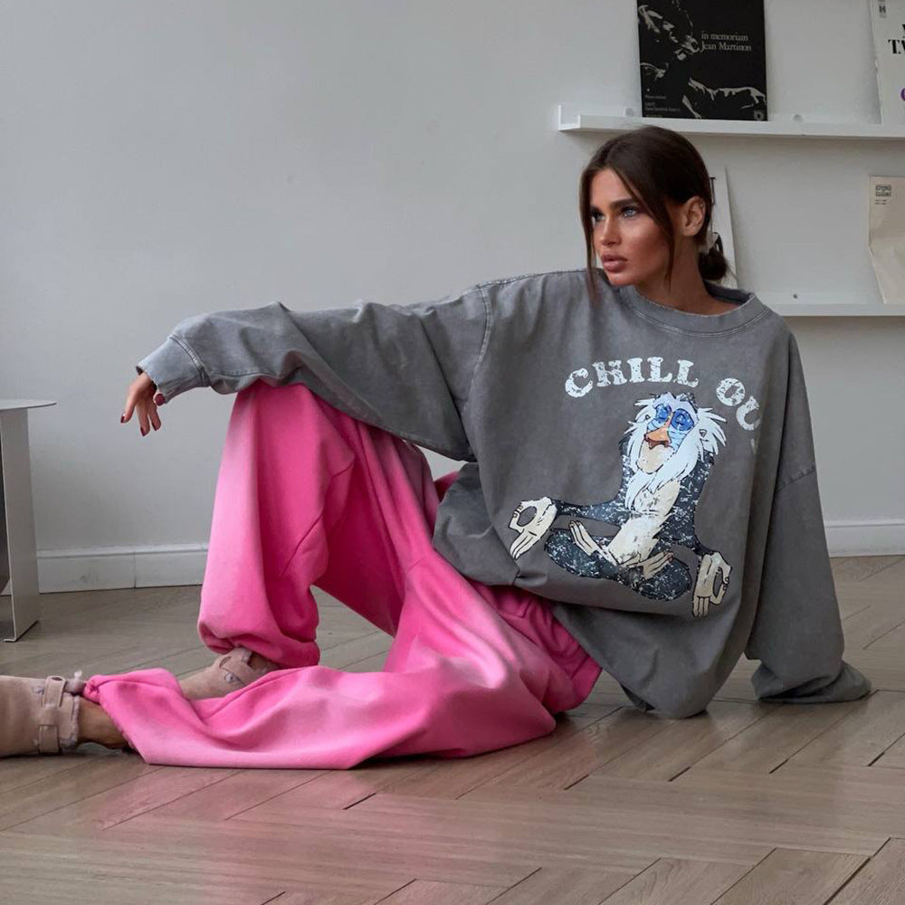 Kvinnors avslappnad tröja med mångsidig grafisk tryck Mirla-Eva Jonsson