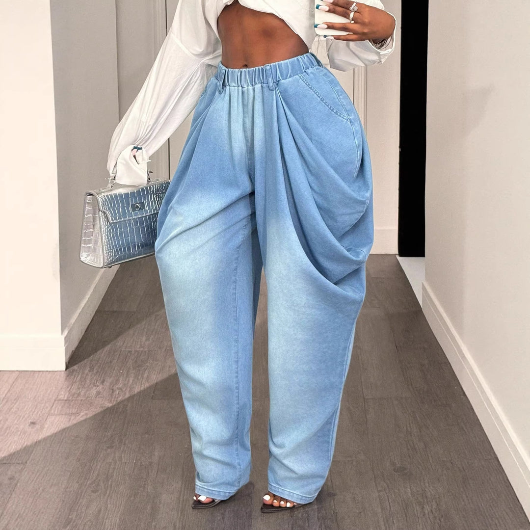 Kvinnors avslappnade baggy jeans med hög midja och praktiska sidofickor Mirla-Eva Jonsson