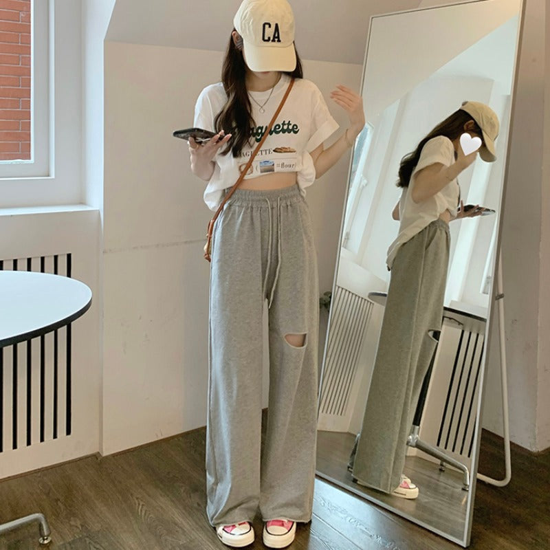 Kvinnors avslappnade breda sweatpants med moderiktig utskärning och elastisk midja-Eva Jonsson