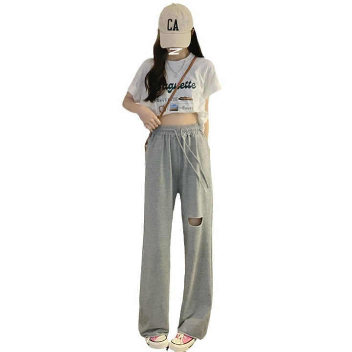 Kvinnors avslappnade breda sweatpants med moderiktig utskärning och elastisk midja-Eva Jonsson