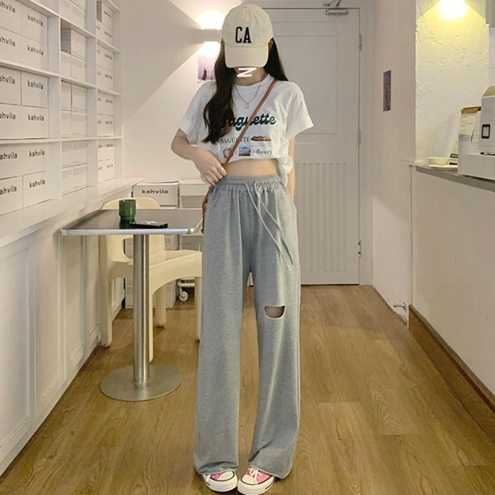 Kvinnors avslappnade breda sweatpants med moderiktig utskärning och elastisk midja-Eva Jonsson