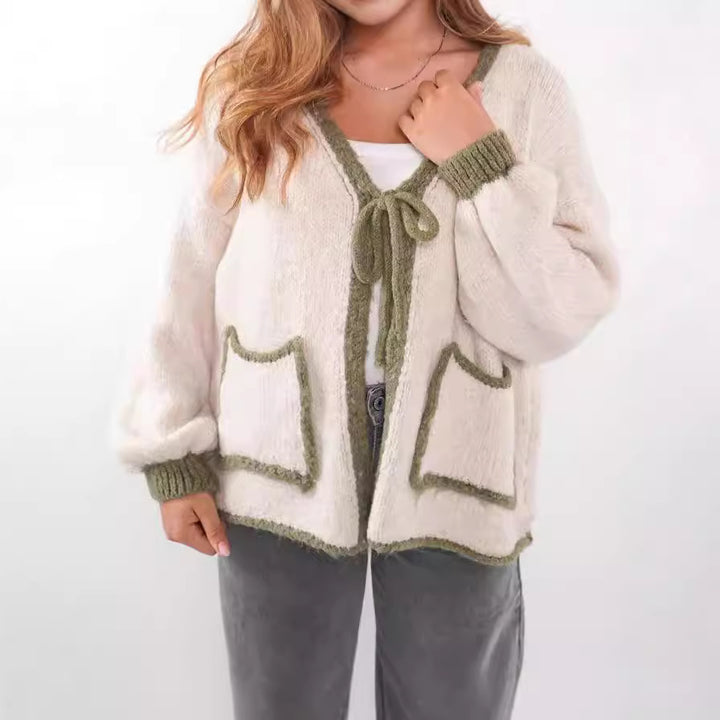 Kvinnors avslappnade cardigan med lekfull dragsko och eleganta fickor Mirla-Eva Jonsson