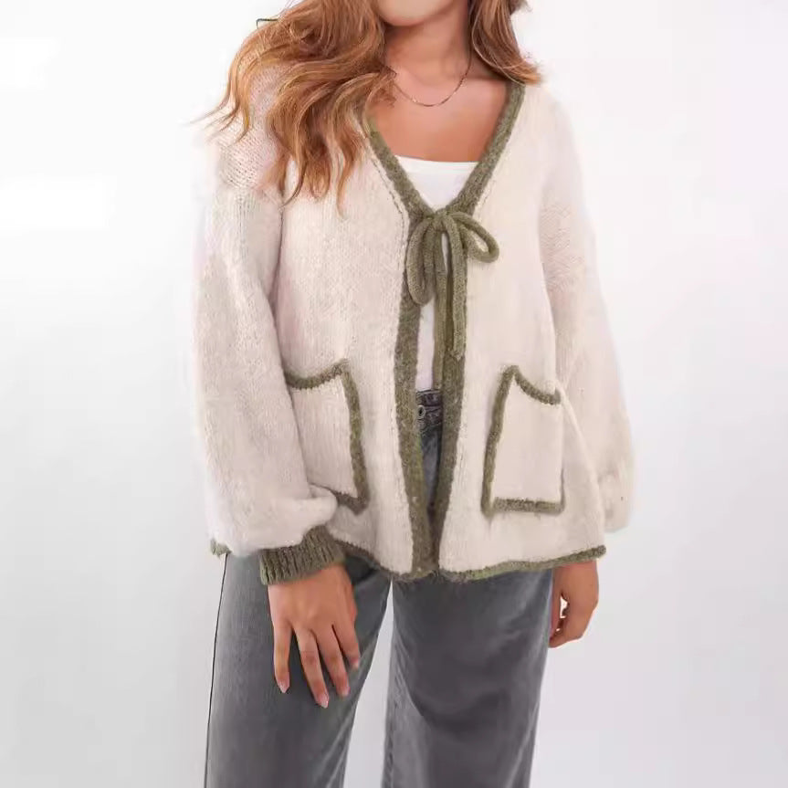 Kvinnors avslappnade cardigan med lekfull dragsko och eleganta fickor Mirla-Eva Jonsson