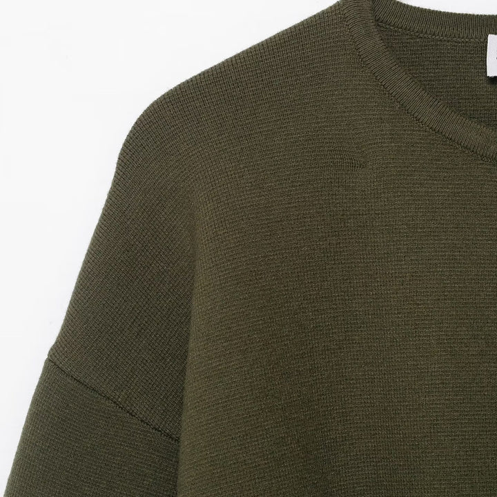 Kvinnors avslappnade cardigan med midjebälte och eleganta knappdetaljer Mirla-Eva Jonsson