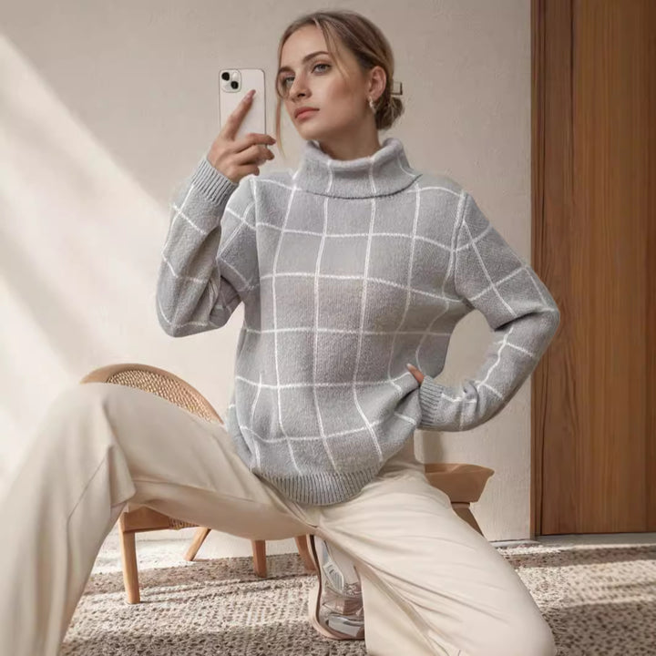 Kvinnors avslappnade chunky stickad tröja med modern rutmönster och hög krage Mirla-Eva Jonsson