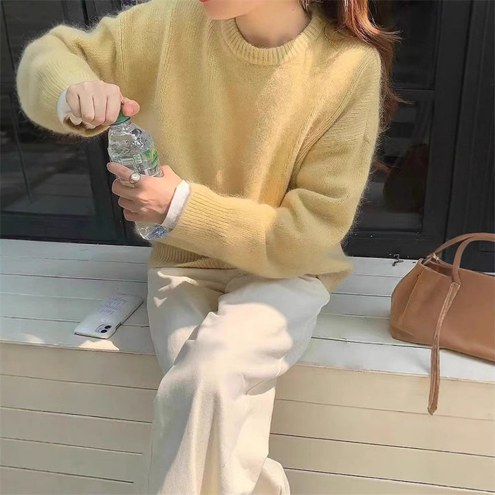 Kvinnors avslappnade chunky stickad tröja med oversized snitt och mjuka ärmar Mirla-Eva Jonsson