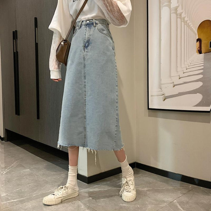 Kvinnors avslappnade denim midi kjol med fransad nederkant-Eva Jonsson