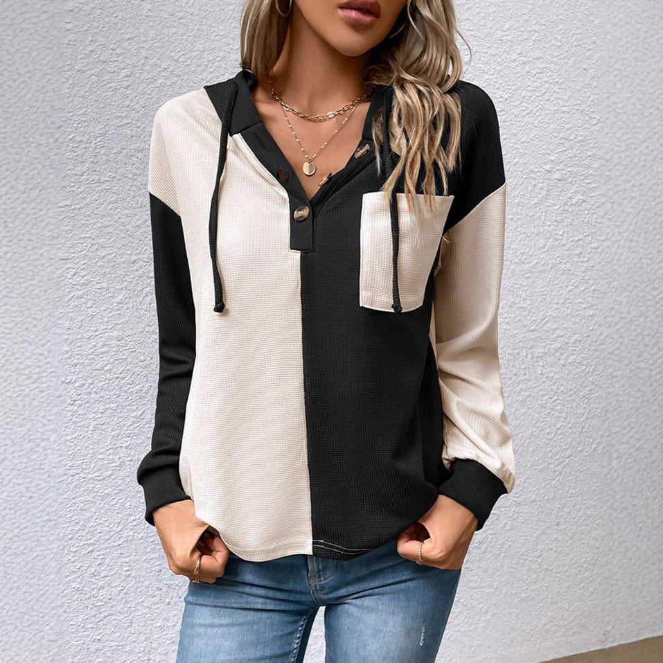 Kvinnors avslappnade hoodie-blus med kontrasterande färger Mirla-Eva Jonsson
