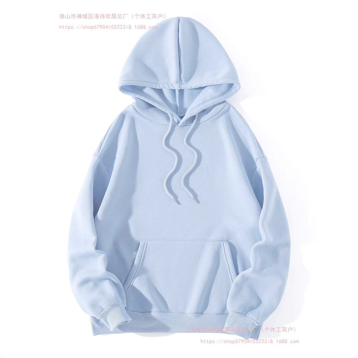 Kvinnors avslappnade hoodie med färgglad fjäderdesign och inspirerande text Mirla-Eva Jonsson