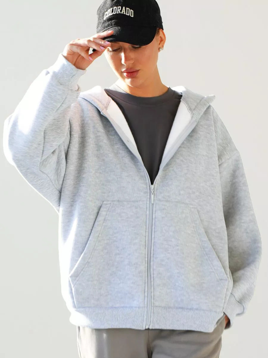 Kvinnors avslappnade hoodie med full dragkedja och stora fickor-Eva Jonsson