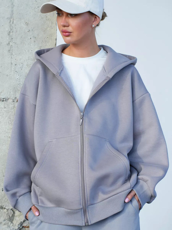 Kvinnors avslappnade hoodie med full dragkedja och stora fickor-Eva Jonsson