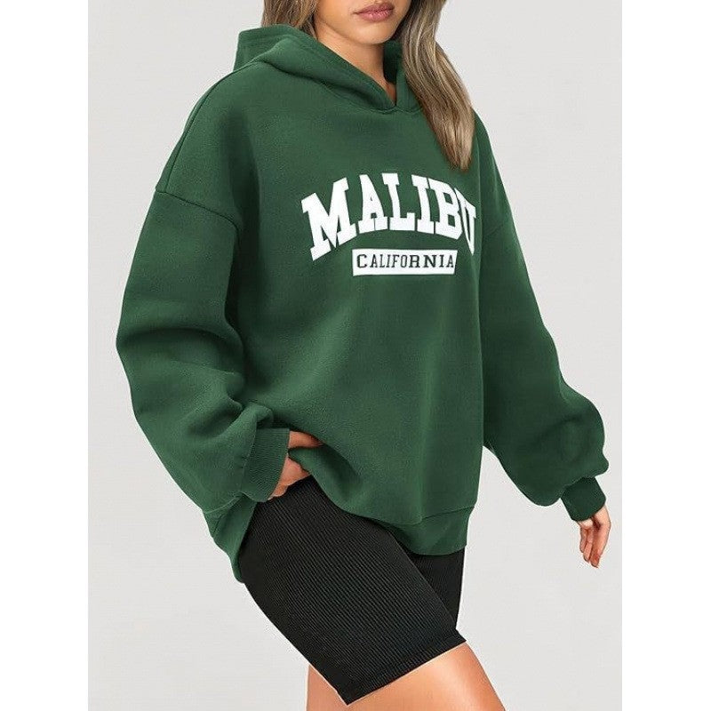 Kvinnors avslappnade hoodie med oversized passform och iögonfallande tryck Mirla-Eva Jonsson