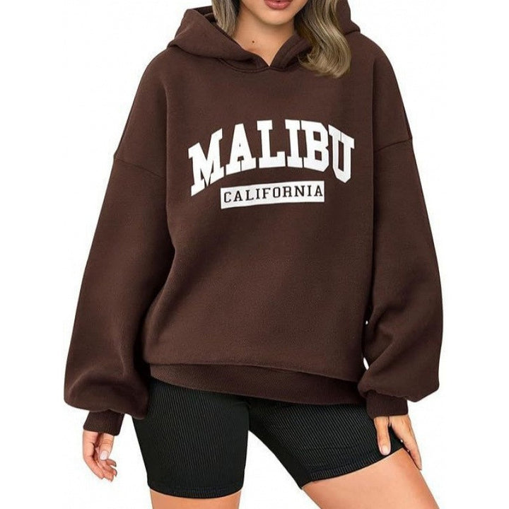 Kvinnors avslappnade hoodie med oversized passform och iögonfallande tryck Mirla-Eva Jonsson