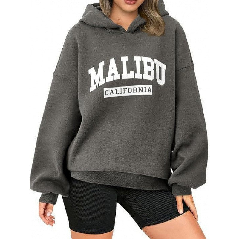 Kvinnors avslappnade hoodie med oversized passform och iögonfallande tryck Mirla-Eva Jonsson