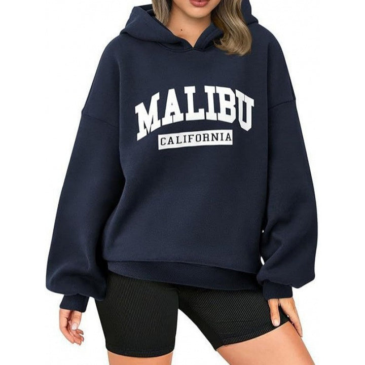 Kvinnors avslappnade hoodie med oversized passform och iögonfallande tryck Mirla-Eva Jonsson