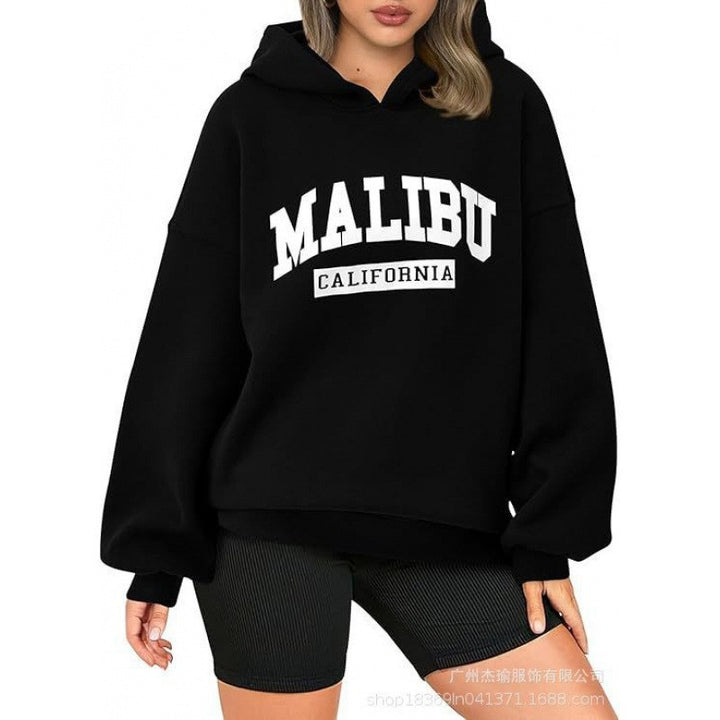 Kvinnors avslappnade hoodie med oversized passform och iögonfallande tryck Mirla-Eva Jonsson