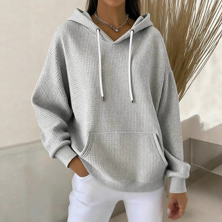 Kvinnors avslappnade hoodie med texturerat tyg Mirla-Eva Jonsson