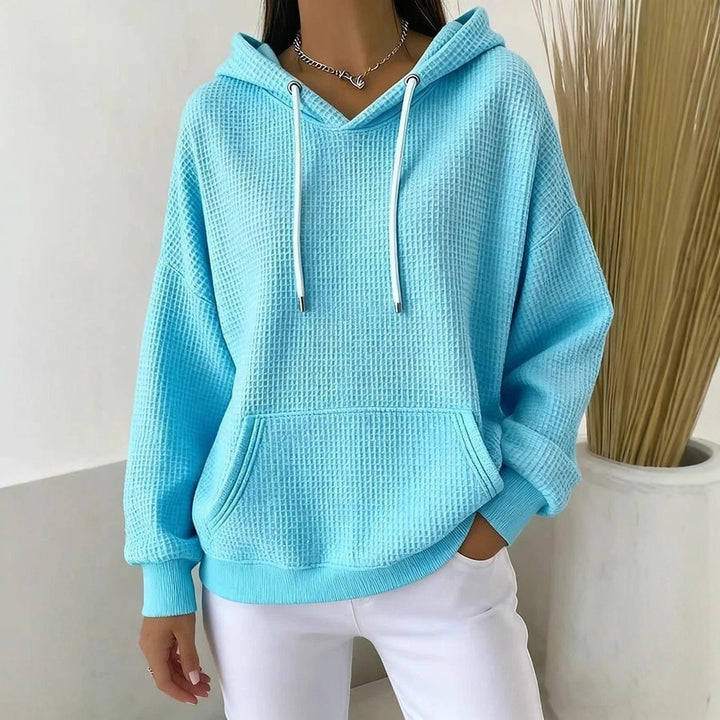 Kvinnors avslappnade hoodie med texturerat tyg Mirla-Eva Jonsson