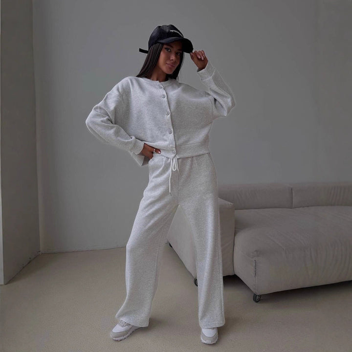 Kvinnors avslappnade hoodie overall med vida ben och knapppdetaljer Mirla-Eva Jonsson