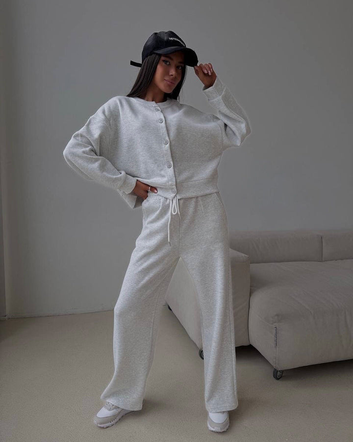 Kvinnors avslappnade hoodie overall med vida ben och knapppdetaljer Mirla-Eva Jonsson