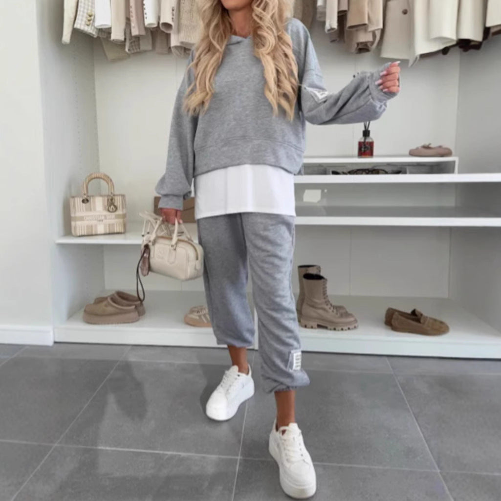 Kvinnors avslappnade hoodie-set med elastisk midja och voluminösa ärmar Mirla-Eva Jonsson