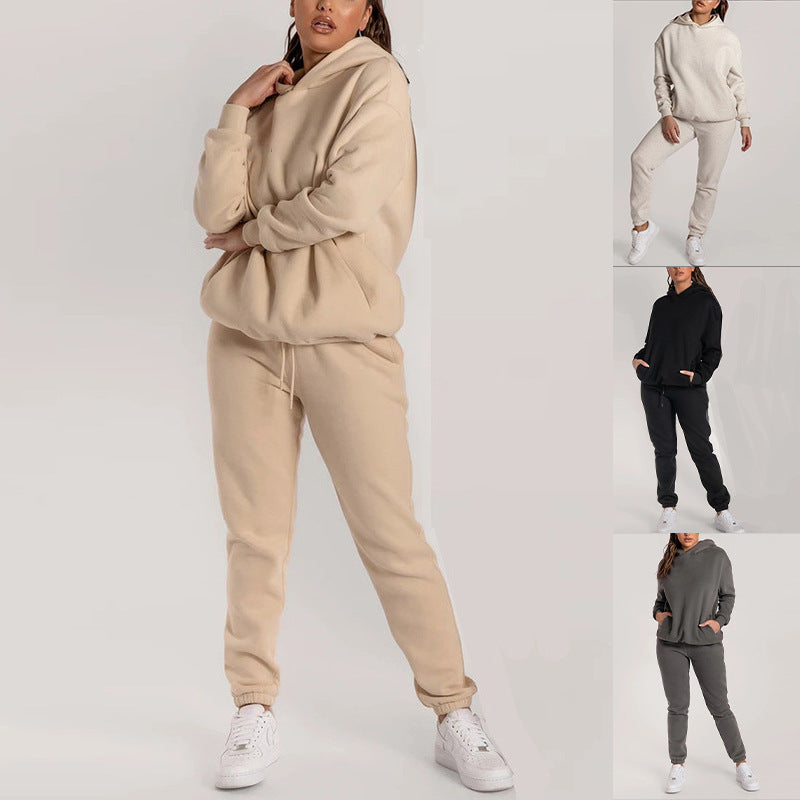 Kvinnors avslappnade hoodie-set med praktiska fickor och elastisk midja Mirla-Eva Jonsson