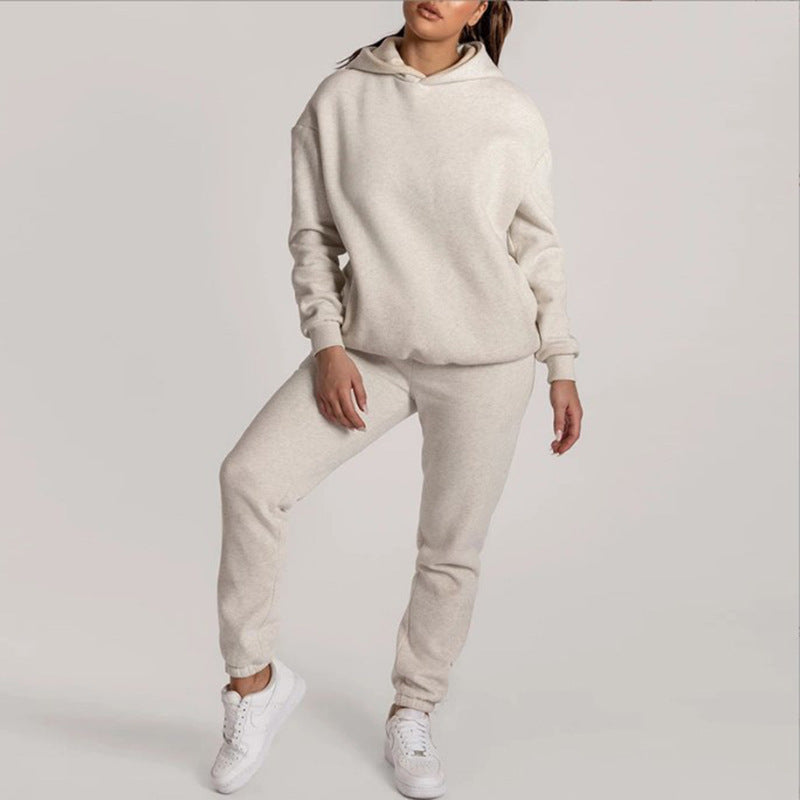 Kvinnors avslappnade hoodie-set med praktiska fickor och elastisk midja Mirla-Eva Jonsson