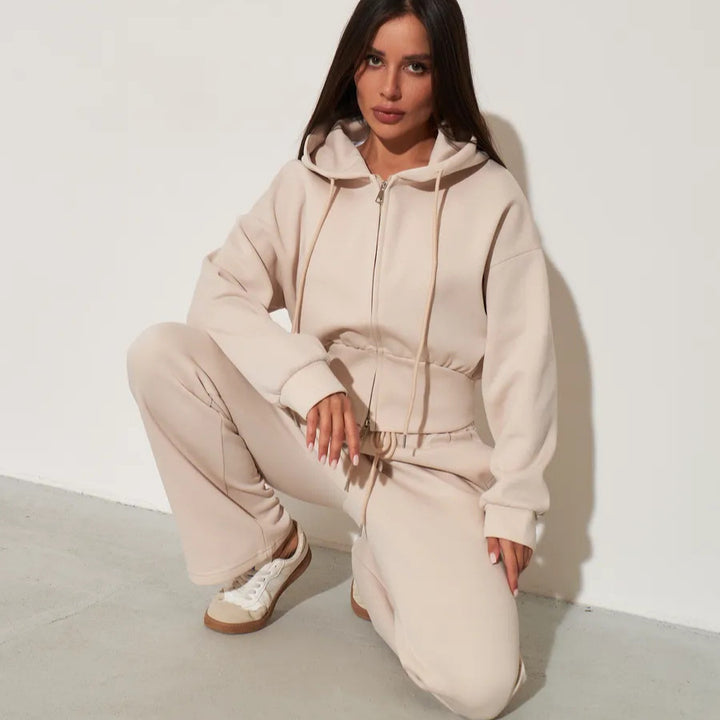 Kvinnors avslappnade hoodie topp och vida sweatpants set med hög midja och dragkedja Mirla-Eva Jonsson
