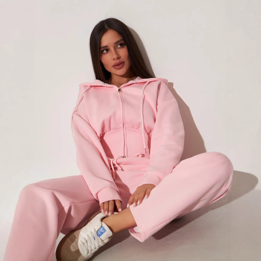 Kvinnors avslappnade hoodie topp och vida sweatpants set med hög midja och dragkedja Mirla-Eva Jonsson