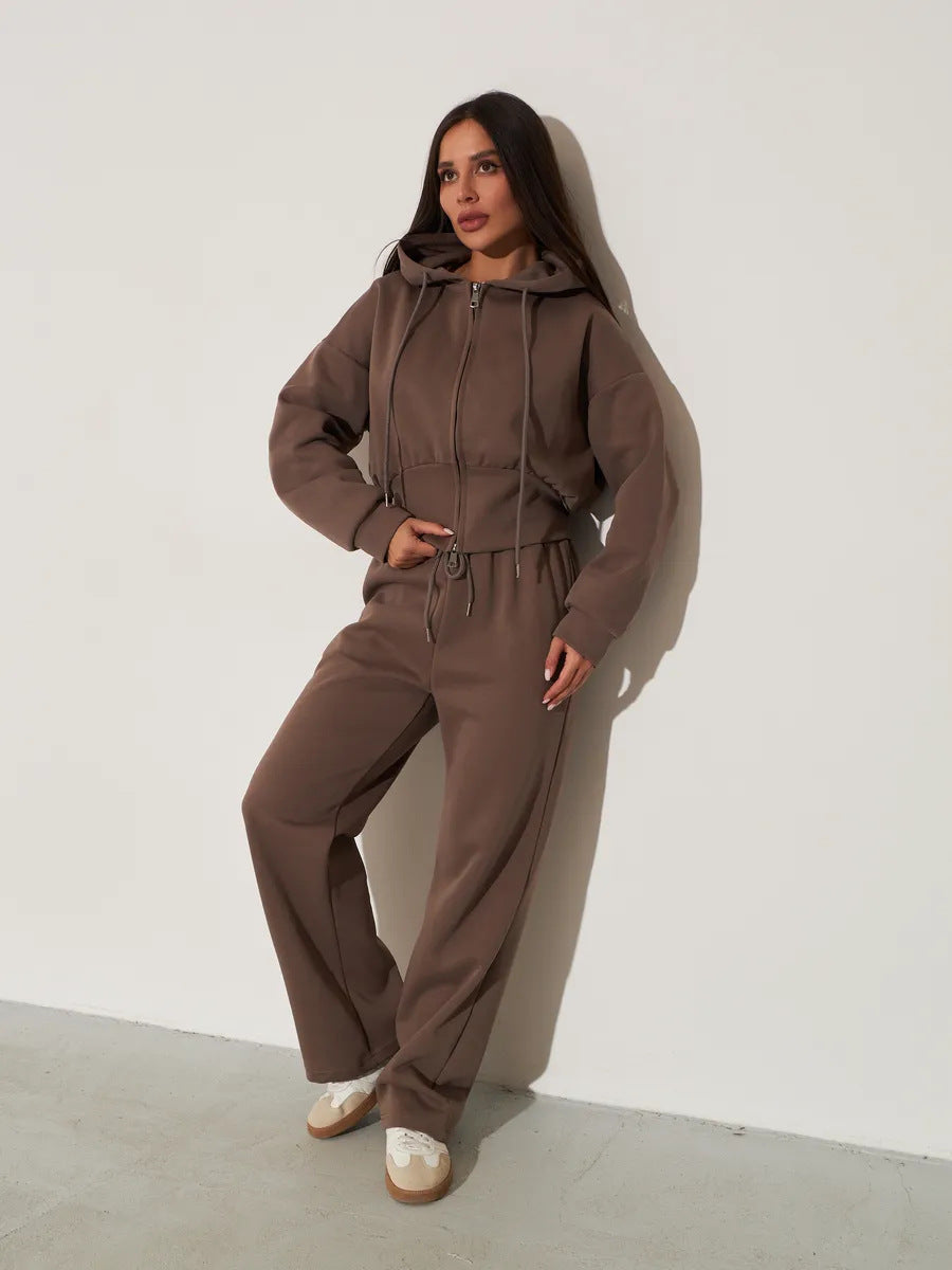 Kvinnors avslappnade hoodie topp och vida sweatpants set med hög midja och dragkedja Mirla-Eva Jonsson