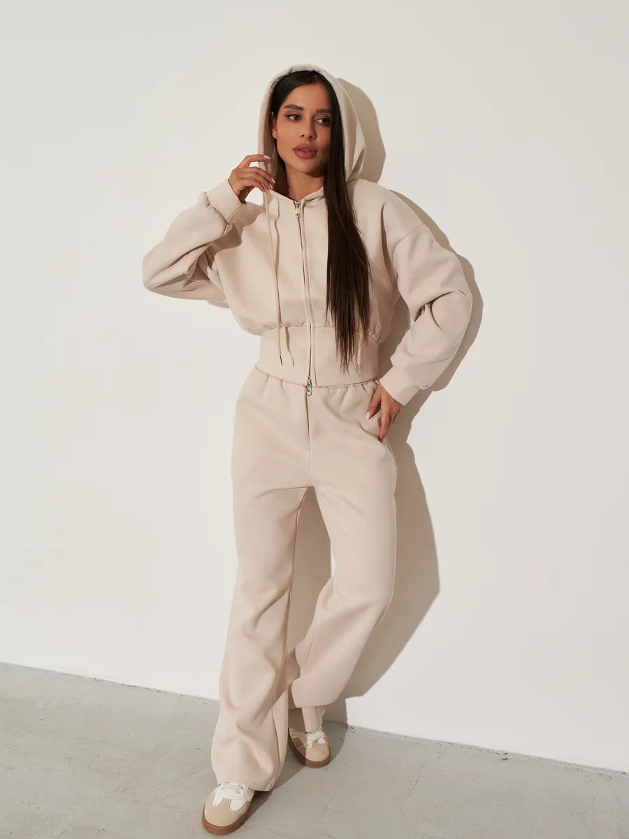 Kvinnors avslappnade hoodie topp och vida sweatpants set med hög midja och dragkedja Mirla-Eva Jonsson