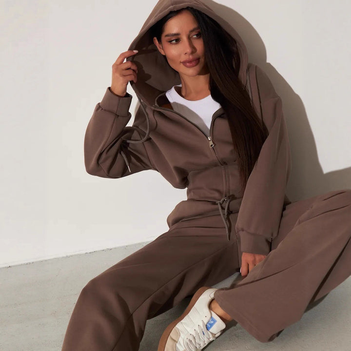 Kvinnors avslappnade hoodie topp och vida sweatpants set med hög midja och dragkedja Mirla-Eva Jonsson