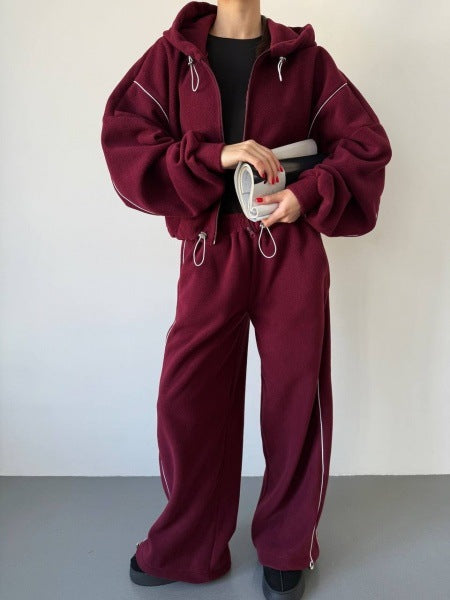 Kvinnors avslappnade hoodie träningsoverall med lösa byxor och sidoremsa Mirla-Eva Jonsson