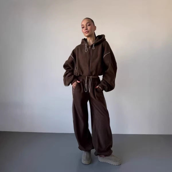 Kvinnors avslappnade hoodie träningsoverall med lösa byxor och sidoremsa Mirla-Eva Jonsson