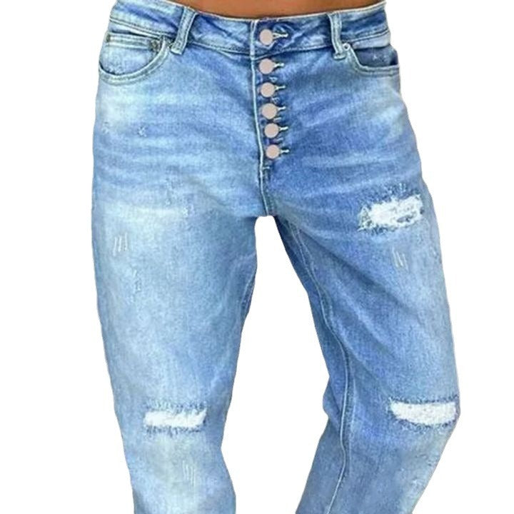 Kvinnors avslappnade jeans med hög knäppning och slitna detaljer Mirla-Eva Jonsson